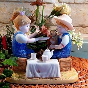 Ðenim Days porcelain Boy n ,,girl enjoying  SOME TEA AND PERHAPS COOKIES.